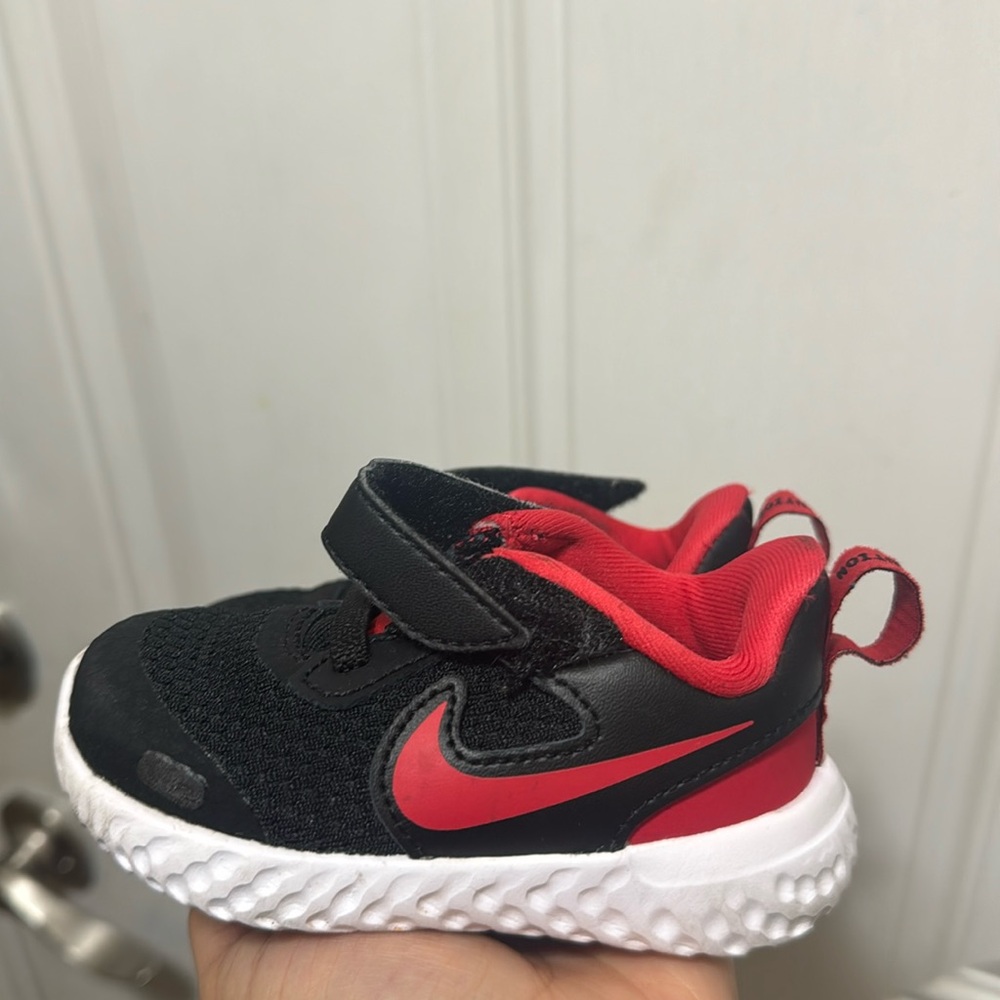 Nike revolution. Size 4c. Worn once, like new.